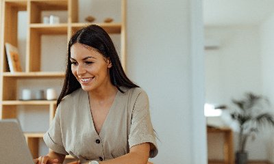 woman on laptop viewing special offers