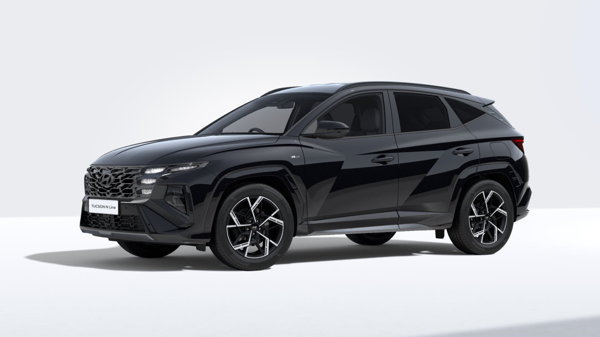 Black SUV with angular design and sporty wheels, viewed from the side.
