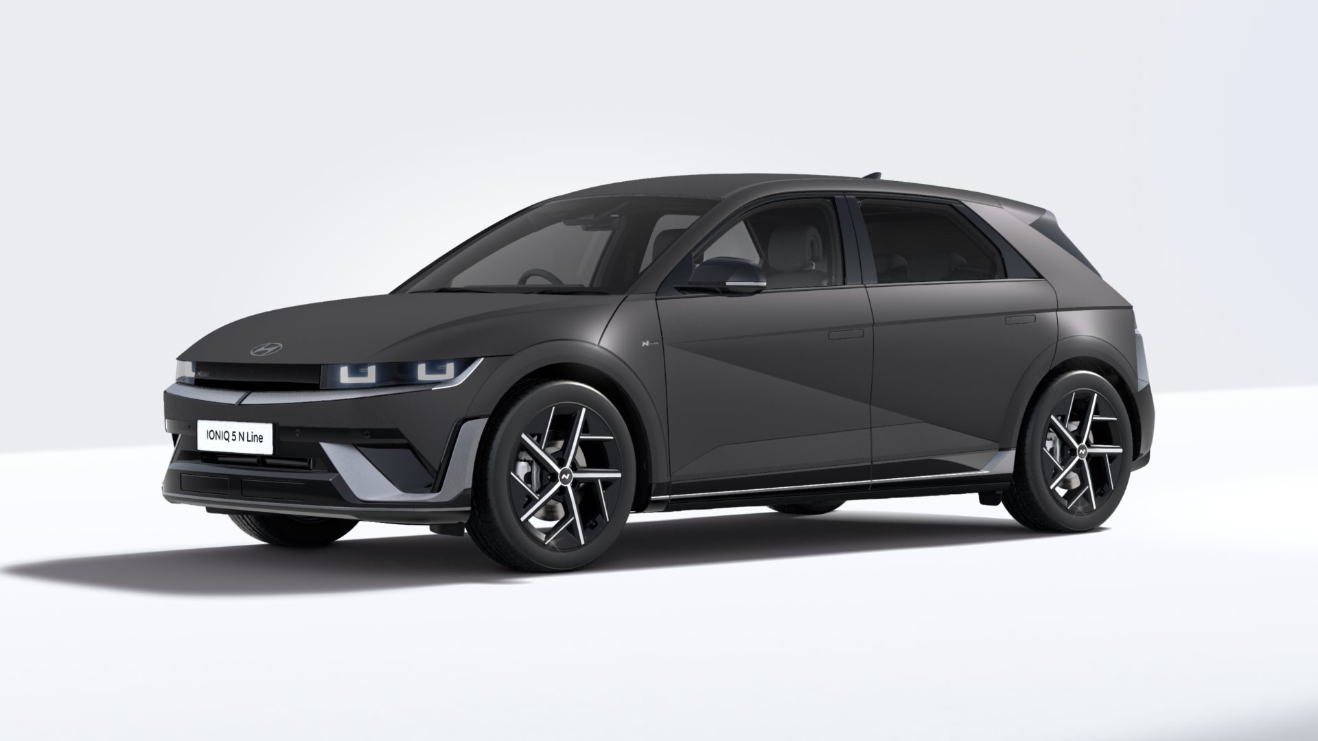 Dark grey Hyundai Ioniq 5 N Line car, front and side view.